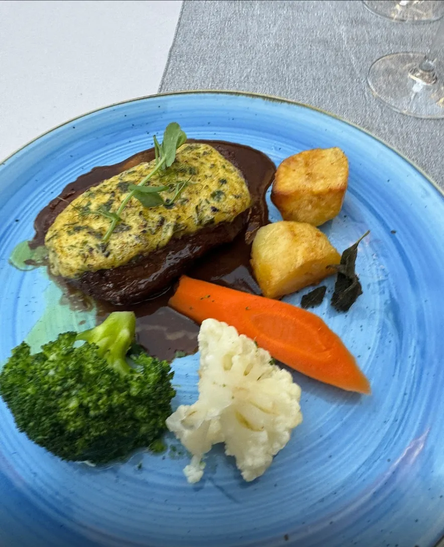 Beef fillet with herb crust and roast potatoes